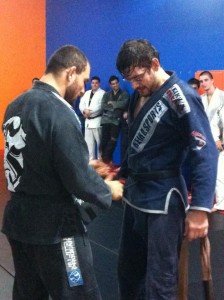 Marcio Oliveira receiving his black belt.